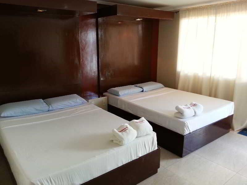 Queen\'S Beach Resort Manoc-Manoc Exterior foto